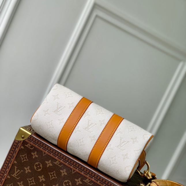 KEEPALL BANDOULIÈRE 25 IN WHITE MONOGRAM HERITAGE CANVAS BRWON CALFSKIN