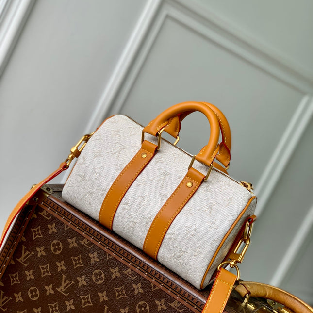 KEEPALL BANDOULIÈRE 25 IN WHITE MONOGRAM HERITAGE CANVAS BRWON CALFSKIN