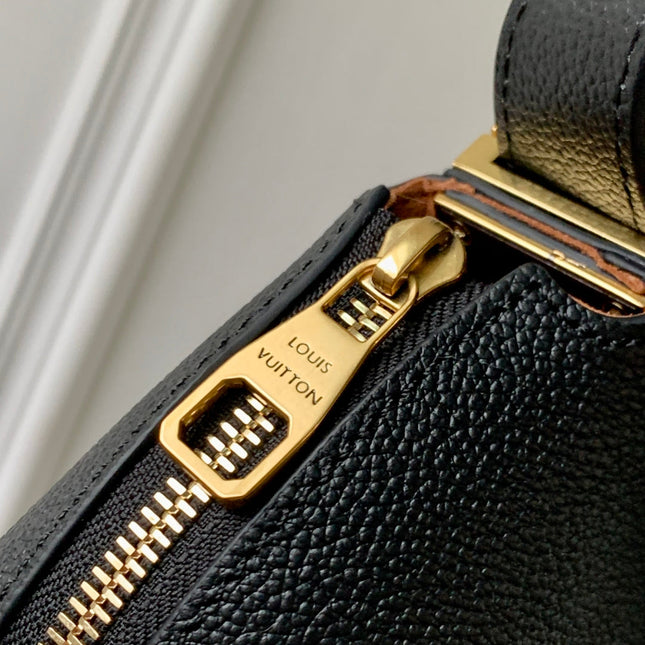 LOW KEY COOKIE MM 32 IN BLACK CALFSKIN BROWN MONOGRAM TAG