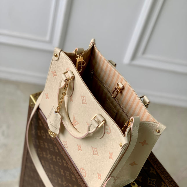 ONTHEGO 25 IN CREAM MONOGRAM EMPREINTE CALFSKIN EMBOSSED LOGO