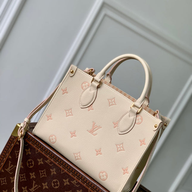 ONTHEGO 25 IN CREAM MONOGRAM EMPREINTE CALFSKIN EMBOSSED LOGO
