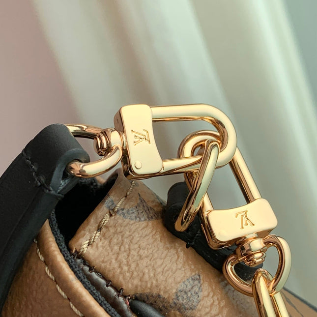 WALLET ON CHAIN IVY 23 IN BROWN MONOGRAM REVERSE CANVAS