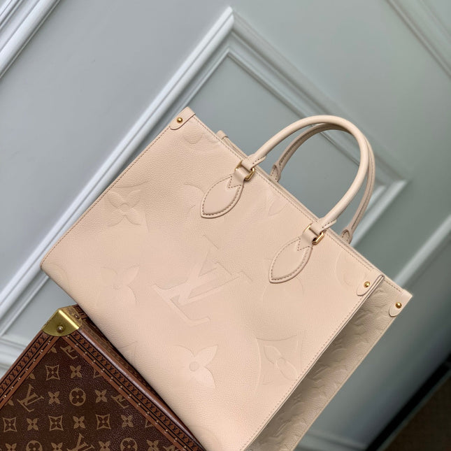 ONTHEGO MM 35 IN  BLUSH PINK MONOGRAM CALFSKIN
