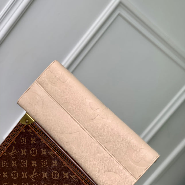 ONTHEGO MM 35 IN  BLUSH PINK MONOGRAM CALFSKIN
