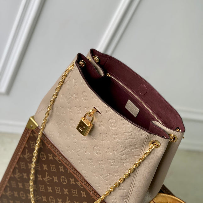 ANYTIME PM 34 IN ASH BROWN MONOGRAM EMPREINTE CALFSKIN