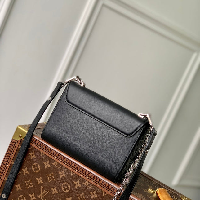 TWIST SLIM 19 IN BLACK TAURILLON CALFSKIN WITH PEARL CHAIN