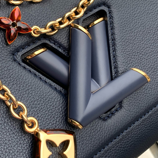 TWIST SLIM 19 IN NAVY BLUE TAURILLON CALFSKIN GOLD HARDWARE