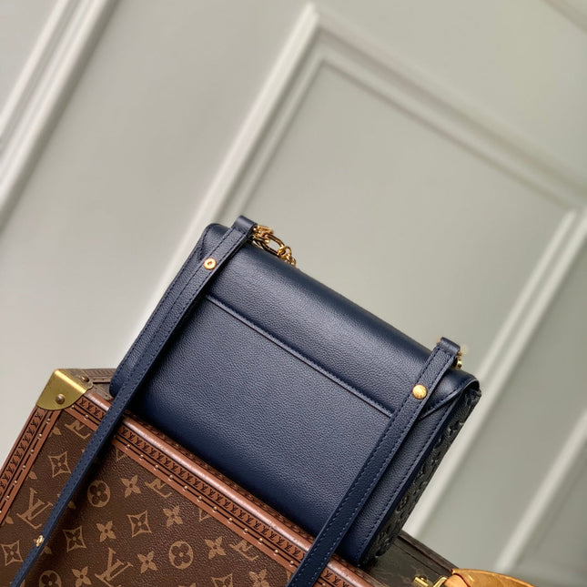 TWIST SLIM 19 IN NAVY BLUE TAURILLON CALFSKIN GOLD HARDWARE
