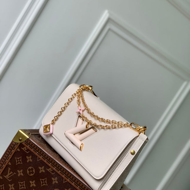 TWIST SLIM 19 IN LIGHT PINK TAURILLON CALFSKIN GOLD HARDWARE