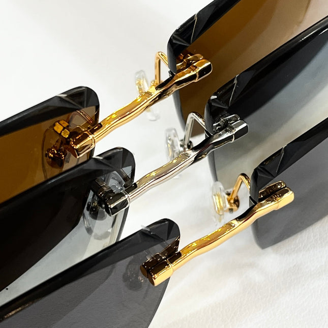 C DE RIMLESS RECTANGULAR FRAME SUNGLASSES CT0612S IN METAL