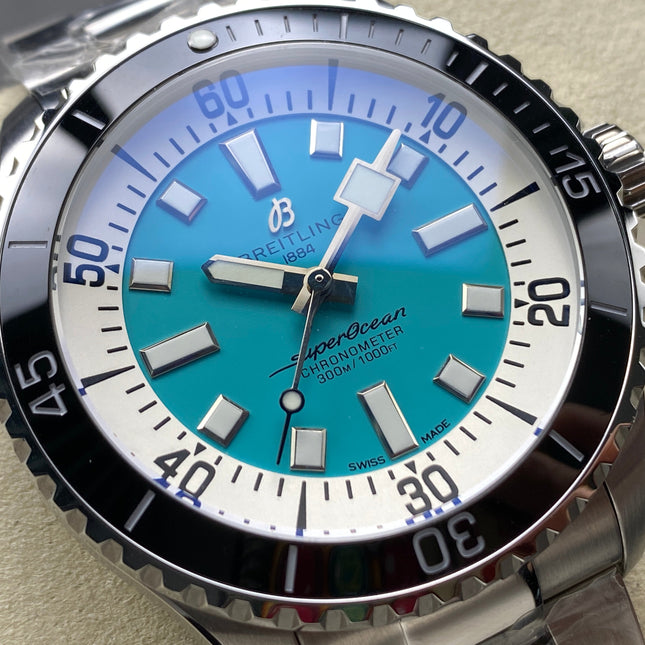 SUPEROCEAN AUTOMATIC 44 BLACK CERAMIC BEZEL BLUE CHILL AND WHITE DIAL
