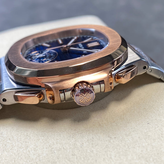 NAUTILUS STEEL AND ROSE GOLD BRACELET BLUE DIAL