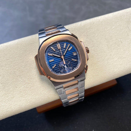 NAUTILUS STEEL AND ROSE GOLD BRACELET BLUE DIAL
