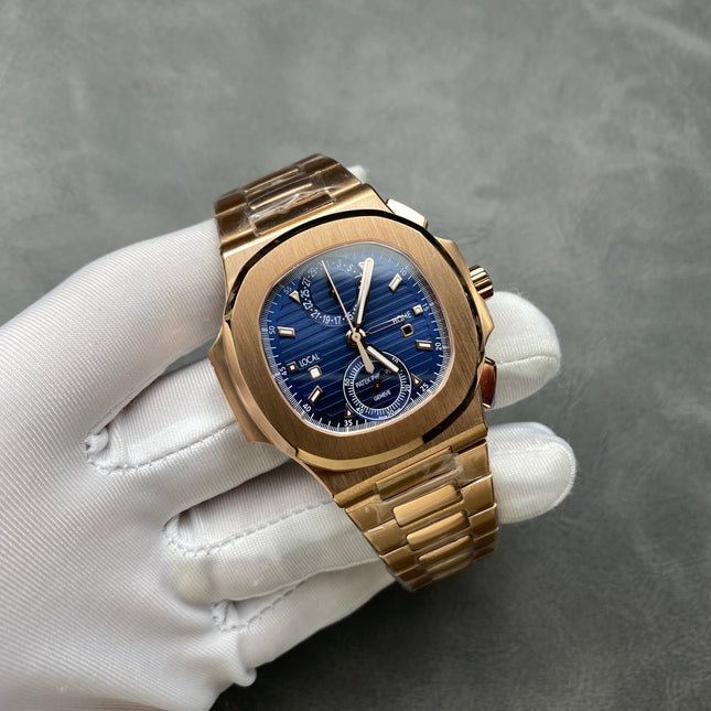 NAUTILUS TRAVEL TIME ROSE GOLD CASE SUNBURST BLUE DIAL