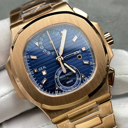 NAUTILUS TRAVEL TIME ROSE GOLD CASE SUNBURST BLUE DIAL