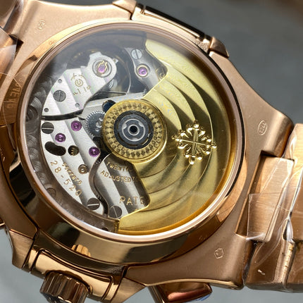 NAUTILUS TRAVEL TIME ROSE GOLD CASE SUNBURST BLUE DIAL