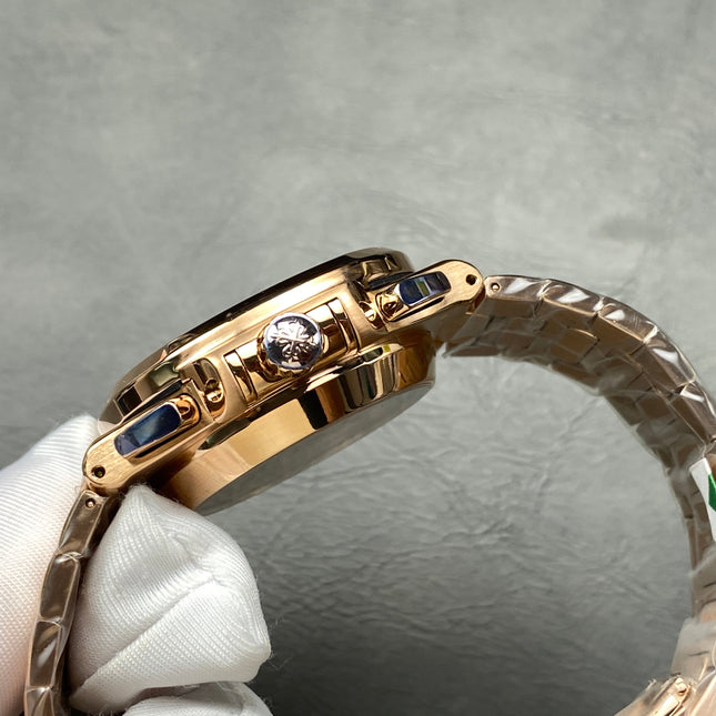 NAUTILUS TRAVEL TIME ROSE GOLD CASE SUNBURST BLUE DIAL