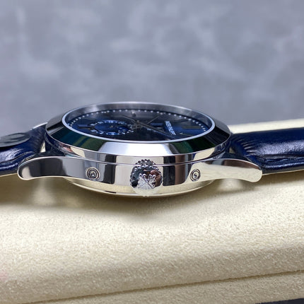 ANNUAL CALENDAR SELF-WINDING WHITE GOLD CASE BLUE SUNBURST DIAL
