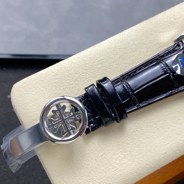 ANNUAL CALENDAR SELF-WINDING WHITE GOLD CASE BROWN BLACK STRAP