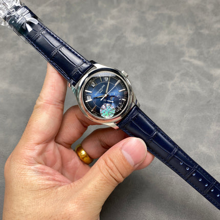 ANNUAL CALENDAR SELF-WINDING WHITE GOLD CASE BLUE SUNBURST DIAL