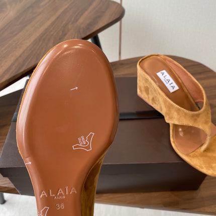 ALAIA WEDGE THONG SANDALS 25S IN BURNT ORANGE SUEDE