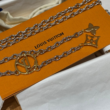 CHAIN BELT FOR WOMEN IN SILVER METAL WITH GOLD MONOGRAM LOGO CHARMS