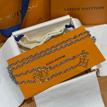 CHAIN BELT FOR WOMEN IN SILVER METAL WITH GOLD MONOGRAM LOGO CHARMS