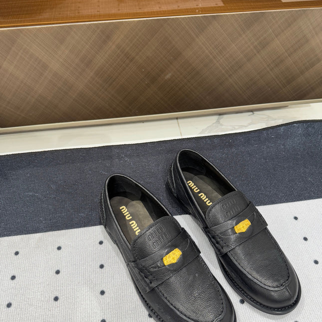 PENNY LOAFERS WITH GOLD COIN IN BLACK CALFSKIN