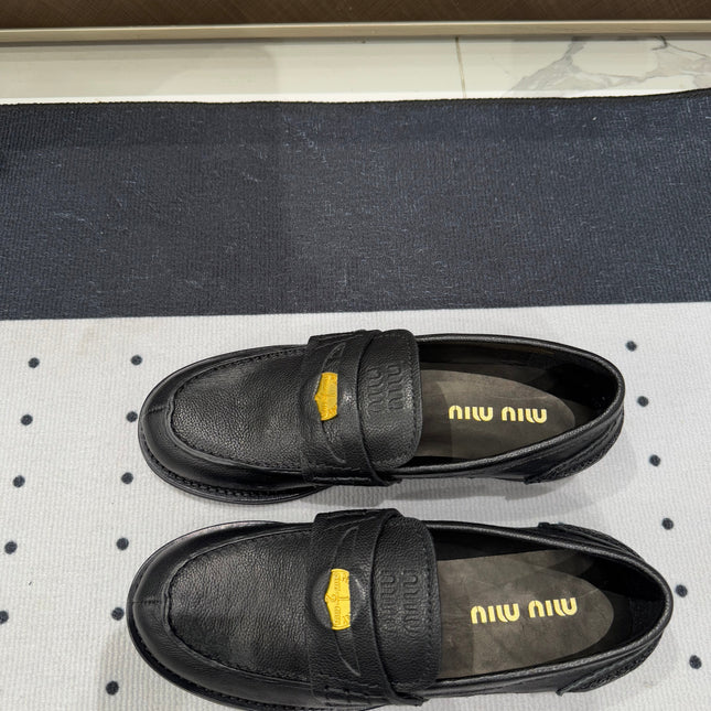 PENNY LOAFERS WITH GOLD COIN IN BLACK CALFSKIN