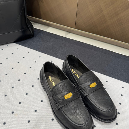 PENNY LOAFERS WITH GOLD COIN IN BLACK CALFSKIN