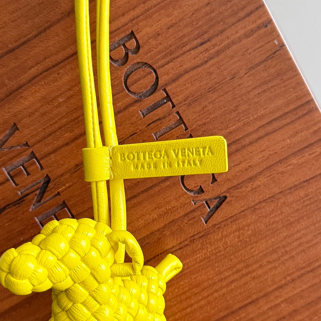 BOTTEGA VENETA 25S DOG CHARM IN LEMON YELLOW CALFSKIN