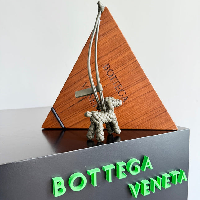 BOTTEGA VENETA 25S DOG CHARM IN GREIGE CALFSKIN