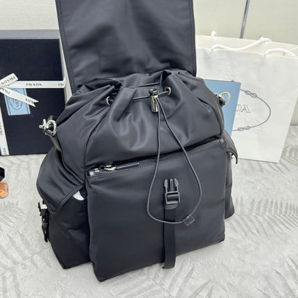 PRADA 25S EXPLORE BACKPACK 39 IN BLACK RE-NYLON AND CALFSKIN