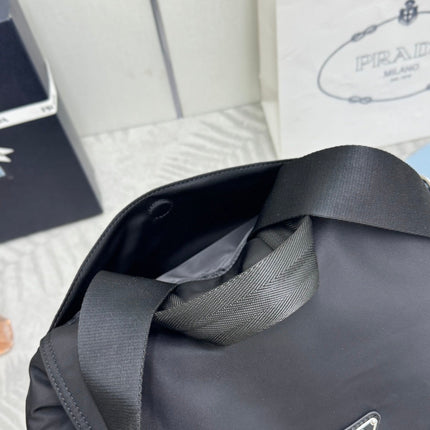 PRADA 25S EXPLORE BACKPACK 39 IN BLACK RE-NYLON AND CALFSKIN