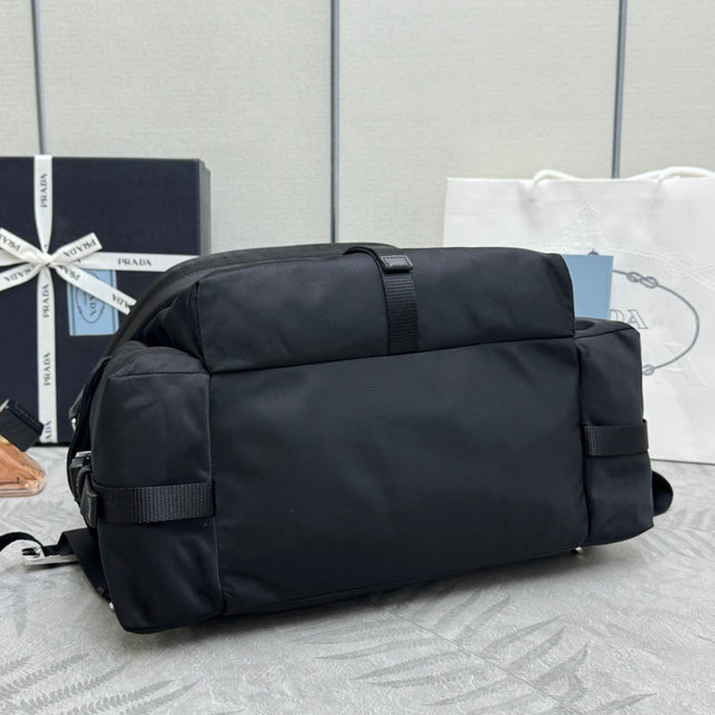 PRADA 25S EXPLORE BACKPACK 39 IN BLACK RE-NYLON AND CALFSKIN
