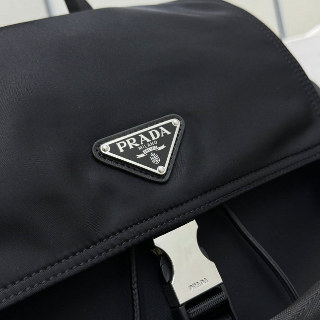 PRADA 25S EXPLORE BACKPACK 39 IN BLACK RE-NYLON AND CALFSKIN