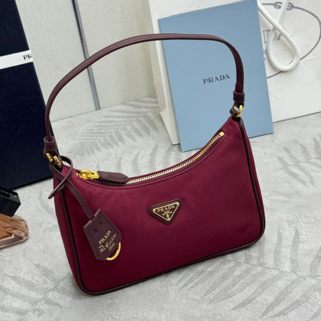 PRADA 25S RE-EDITION 2005 MINI BAG 22 IN BURGUNDY RE-NYLON AND SAFFIANO