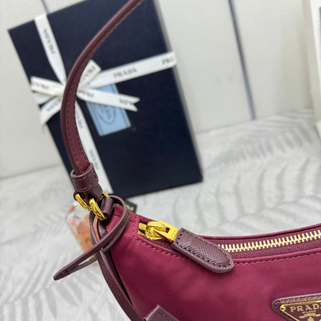 PRADA 25S RE-EDITION 2005 MINI BAG 22 IN BURGUNDY RE-NYLON AND SAFFIANO
