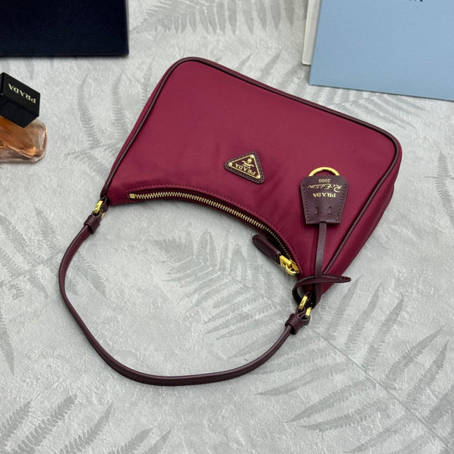 PRADA 25S RE-EDITION 2005 MINI BAG 22 IN BURGUNDY RE-NYLON AND SAFFIANO