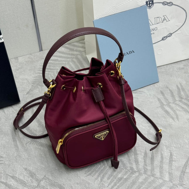 PRADA 25S DUET BUCKET BAG 23 IN BURGUNDY RE-NYLON GOLD HARDWRE