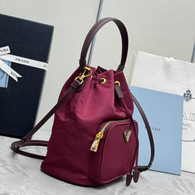 PRADA 25S DUET BUCKET BAG 23 IN BURGUNDY RE-NYLON GOLD HARDWRE