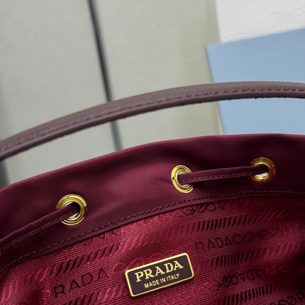 PRADA 25S DUET BUCKET BAG 23 IN BURGUNDY RE-NYLON GOLD HARDWRE