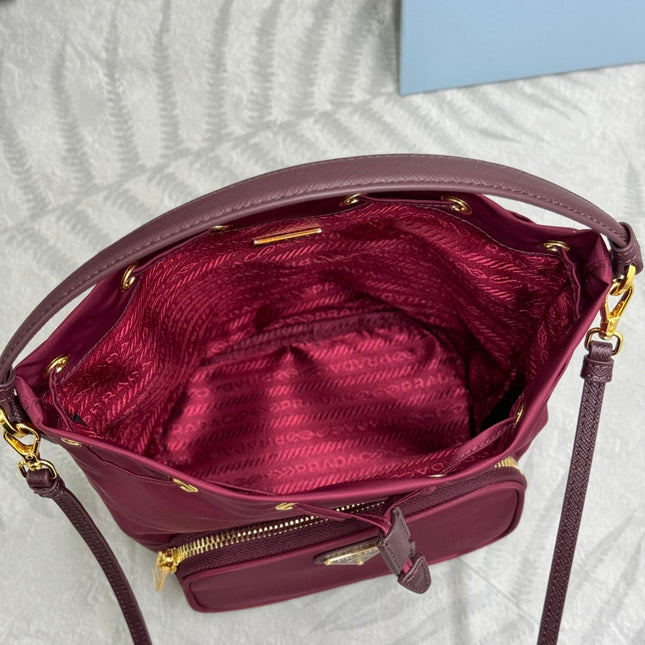 PRADA 25S DUET BUCKET BAG 23 IN BURGUNDY RE-NYLON GOLD HARDWRE