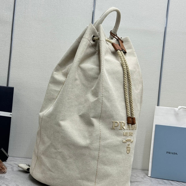 PRADA 25S DRAWSTRING BACKPACK 55 IN BEIGE CANVAS LINEN SILVER HARDWRE