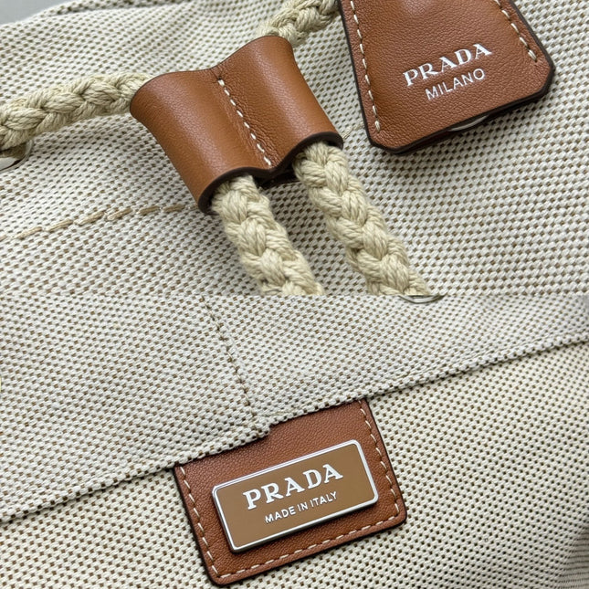 PRADA 25S DRAWSTRING BACKPACK 55 IN BEIGE CANVAS LINEN SILVER HARDWRE
