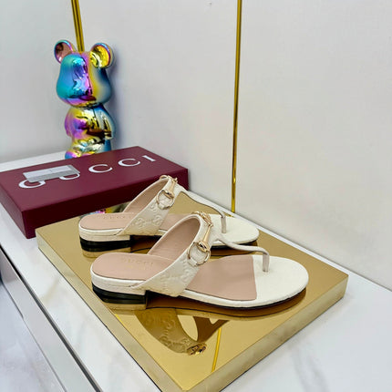 GG THONG SANDALS 25S IN WHITE LAMBSKIN WITH GOLD HARDWARE