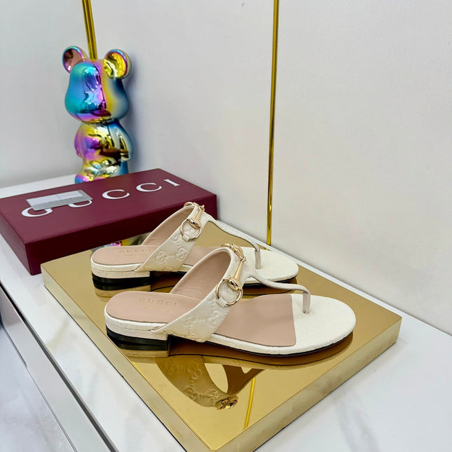 GG THONG SANDALS 25S IN WHITE LAMBSKIN WITH GOLD HARDWARE