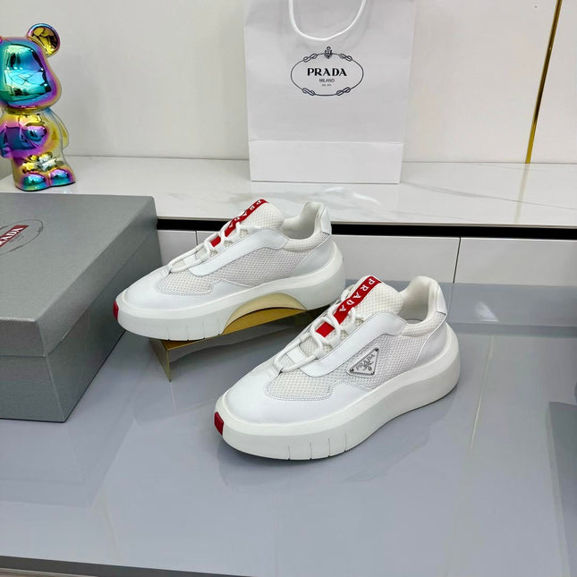 PRADA 25S CROSS LACED SNEAKERS IN WHITE CALFSKIN