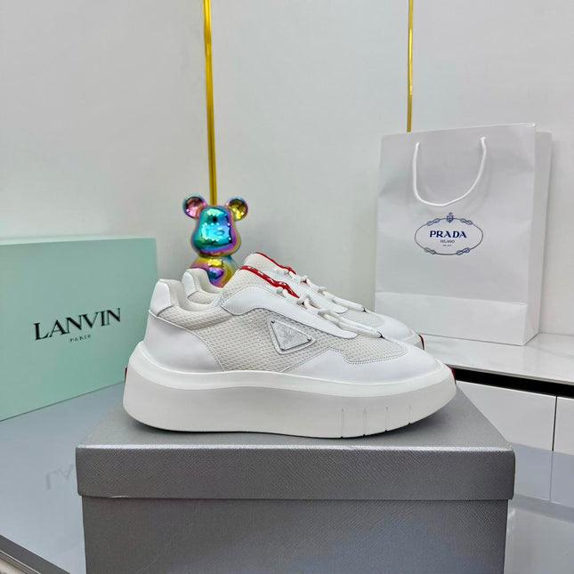 PRADA 25S CROSS LACED SNEAKERS IN WHITE CALFSKIN