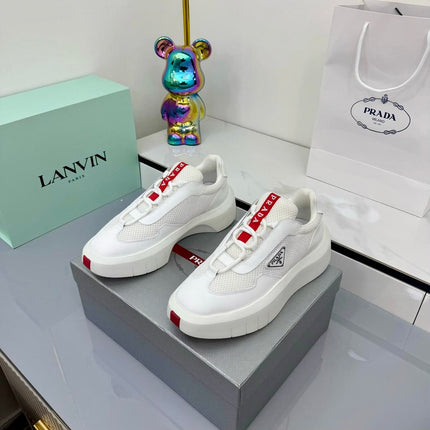 PRADA 25S CROSS LACED SNEAKERS IN WHITE CALFSKIN